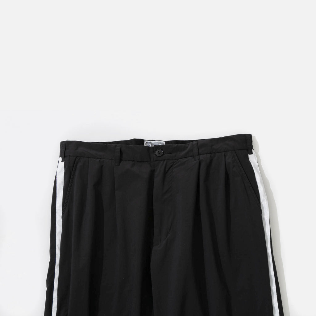 Taped TN Two Tuck Pants in Black from the Cav Empt blues store www.bluesstore.co