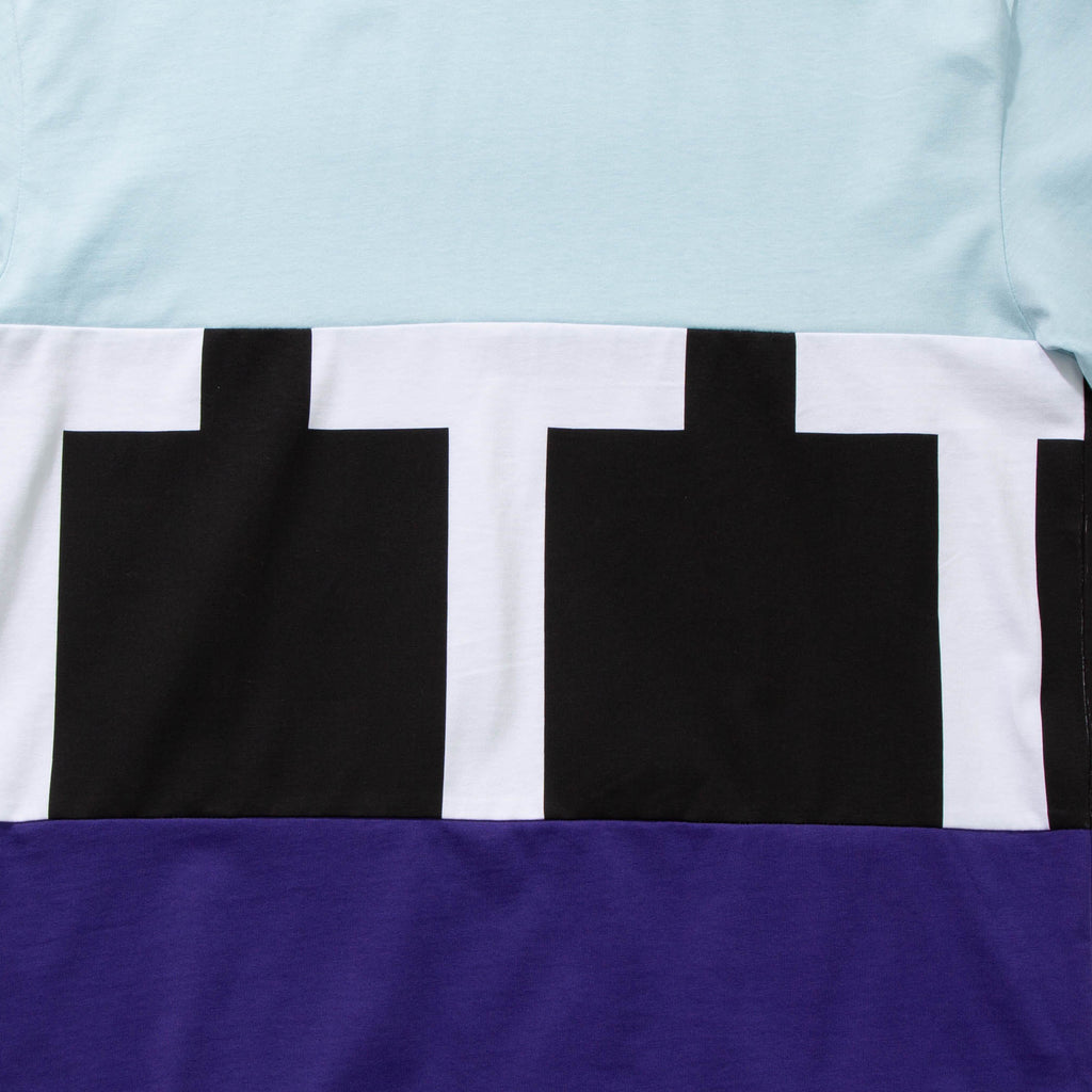 Cut & sew t-shirt in light blue, black and purple from The Trilogy Tapes blues store www.bluesstore.co