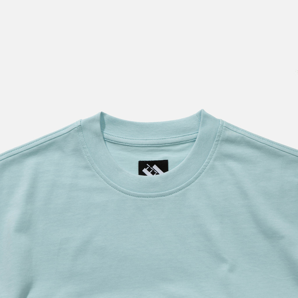 Cut & sew t-shirt in light blue, black and purple from The Trilogy Tapes blues store www.bluesstore.co